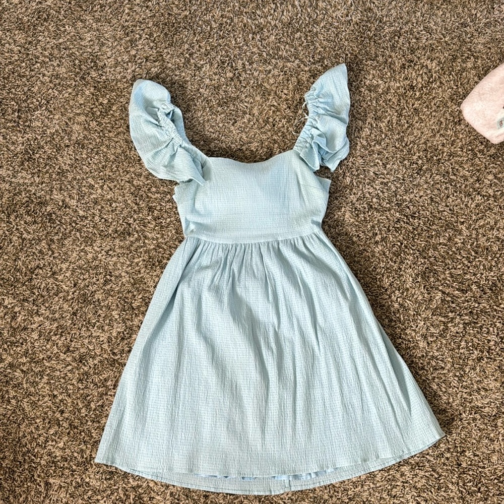 This is from Francesca’s. It’s a light blue with a bow in the back.